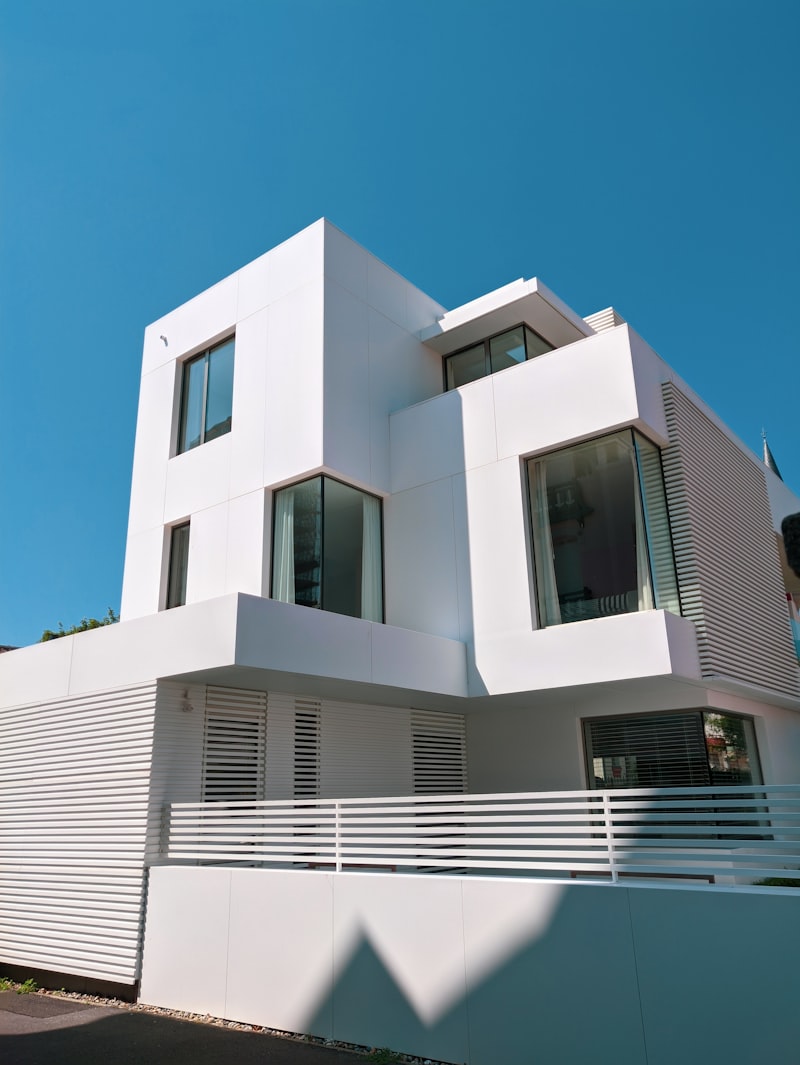 A clean white rendered frontage